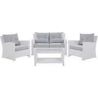Beliani Lounge 4er Set Weiß in Rattanoptik Grauen Bezüge Mit Sitzkissen Dekorativ Elegant Modern