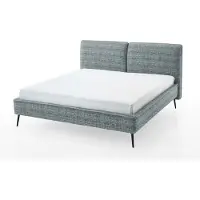 Meise Polsterbett Infinity 200x200 cm | Doppelbett | Bettgestell | Kopfteil in Kissenoptik | Webstoff Ozeanblau | Metallfuß schwarz