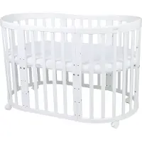 Waldin Babybett Oval 7in1 aus Holz mit Matratze, Rollen, Regal, Weiß
