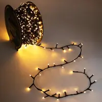 Spetebo Außen Lichterkette auf Trommel soft gold 30 m mit Stecker - 1000 LED - Weihnachtslichterkette mit Dual Timer und 8 Funktionen