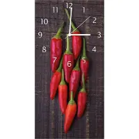 Wallario Design Wanduhr Rote Paprikaschoten auf einem dunkelbraunem Holzbrett aus Echtglas, Größe 30 x 60 cm