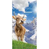 Wallario Design Wanduhr bedruckt, Größe 30 x 60 cm, Motiv: Kuh im Sonnenschein in den Alpen
