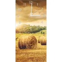 Wallario Design Wanduhr bedruckt, Größe 30 x 60 cm, Motiv: Strohballen auf dem Feld bei Sonnenuntergang