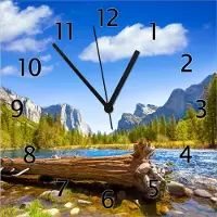 Wallario Design Wanduhr Baumstamm im Fluss zwischen Bergen und Wäldern aus Echtglas, Größe 30 x 30 cm