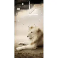 Wallario Design Wanduhr bedruckt, Größe 30 x 60 cm, Motiv: Stattlicher ruhender Löwe in Afrika in Sepiafarben