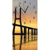 Wallario Design Wanduhr Vasco da Gama Brücke aus Echtglas, Größe 30 x 60 cm