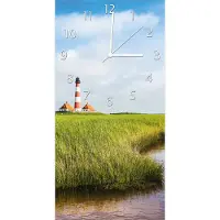 Wallario Design Wanduhr bedruckt, Größe 30 x 60 cm, Motiv: Kleiner Bach durch Schilf auf dem Weg zum Leuchtturm