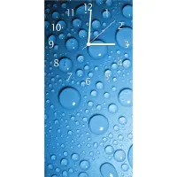 Wallario Design Wanduhr bedruckt, Größe 30 x 60 cm, Motiv: Wassertropfen auf Blau