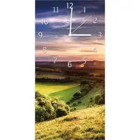 Wallario Design Wanduhr Farbenfroher Sonnenuntergang in England aus Echtglas, Größe 30 x 60 cm