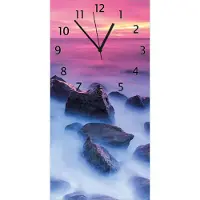 Wallario Design Wanduhr bedruckt, Größe 30 x 60 cm, Motiv: Felsen im Meer bei Sonnenuntergang