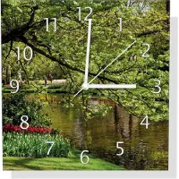 Wallario Design Wanduhr Bunte Blumen im Park am Wasser - Frühblüher am Ufer aus Aluverbund, Größe 30 x 30 cm