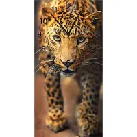 Wallario Design Wanduhr bedruckt, Größe 30 x 60 cm, Motiv: Leopard in Nahaufnahme beim Laufen