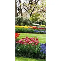Wallario Design Wanduhr bedruckt, Größe 30 x 60 cm, Motiv: Bunte Blumen und Kirsch-Baum im Park blühen im Frühling