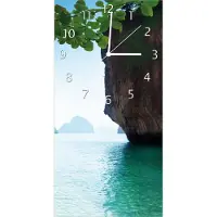 Wallario Design Wanduhr bedruckt, Größe 30 x 60 cm, Motiv: Fischerboot in Thailand blaues Meer und Steinfelsen