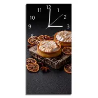 Wallario Design Wanduhr Törtchen auf dunkler Bühne aus Echtglas, Größe 30 x 60 cm