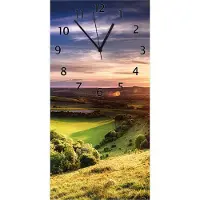 Wallario Design Wanduhr Farbenfroher Sonnenuntergang in England aus Echtglas, Größe 30 x 60 cm