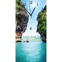 Wallario Design Wanduhr Felsenschlucht am Meer in Thailand aus Echtglas, Größe 30 x 60 cm