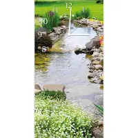 Wallario Design Wanduhr bedruckt, Größe 30 x 60 cm, Motiv: Blumen am Teich