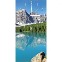 Wallario Design Wanduhr bedruckt, Größe 30 x 60 cm, Motiv: Tiefblauer See mit Bergpanorama und Wäldern Kanada