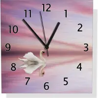 Wallario Design Wanduhr Weißer Schwan im rosafarbenen See aus Aluverbund, Größe 30 x 30 cm
