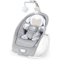 Ingenuity Faltbare Babywippe – Kleines Schaf – Feste oder schaukelnde Position. Vibrationen und Geräusche. Bogen. Lernspielzeug.