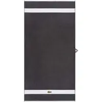 Lacoste Duschtuch "LCASUAL", grau (bitume), B:70cm L:140cm, Frottier, Obermaterial: 100% Baumwolle, Handtücher, Duschtuch, mit Label-Applikationen und Bordüre